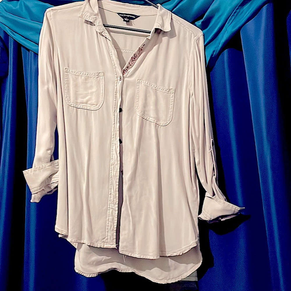 Tan/cream long sleeve button up top.